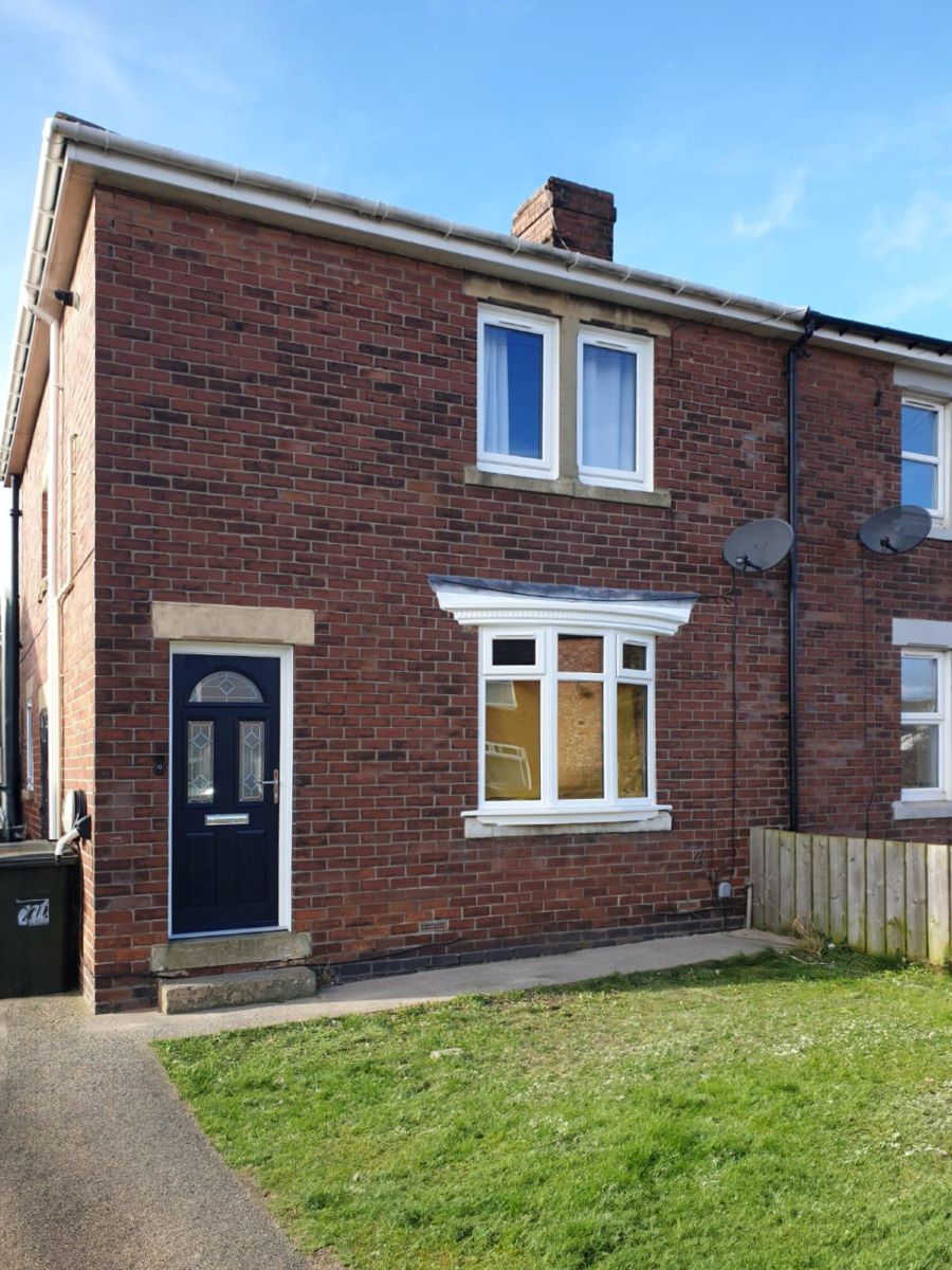 white upvc bow window front of property